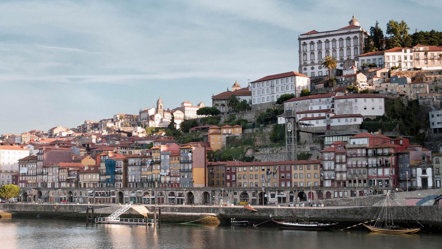 The riverbank Duero River in Porto. Buildings in the historic area of the city to the river bank.