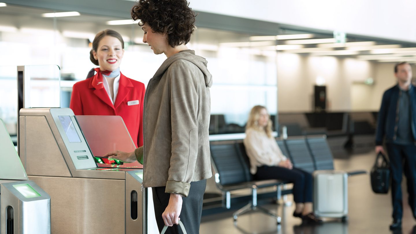 Woman checks in at the terminal gate