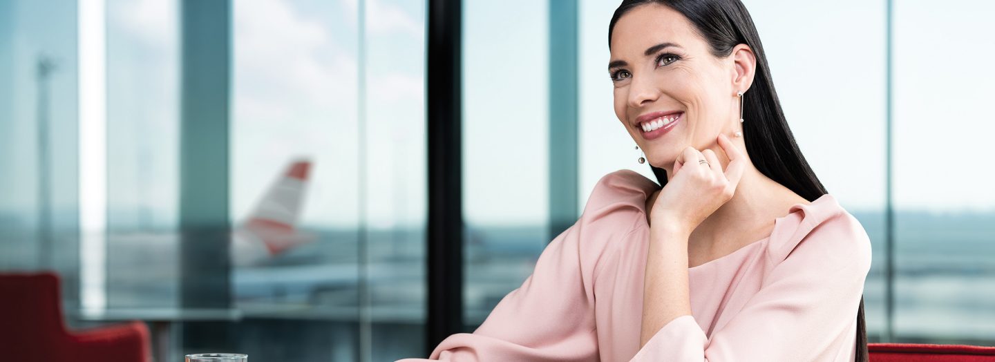 Businesswoman enjoys coffee and cake in an Austrian lounge
