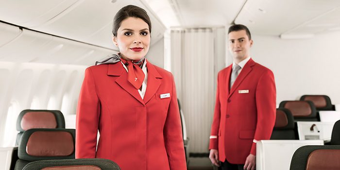 Two Austrian flight attendants on the airplane