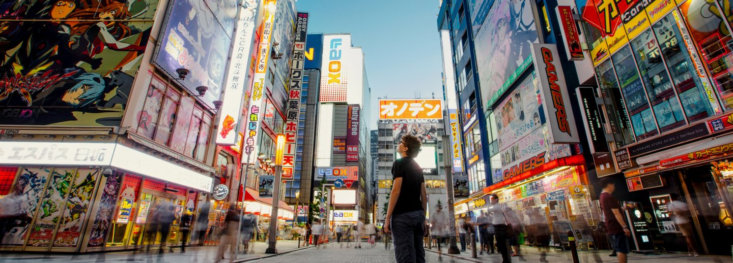 Young man at Akihabara electric town, street view, Tokyo, Japan